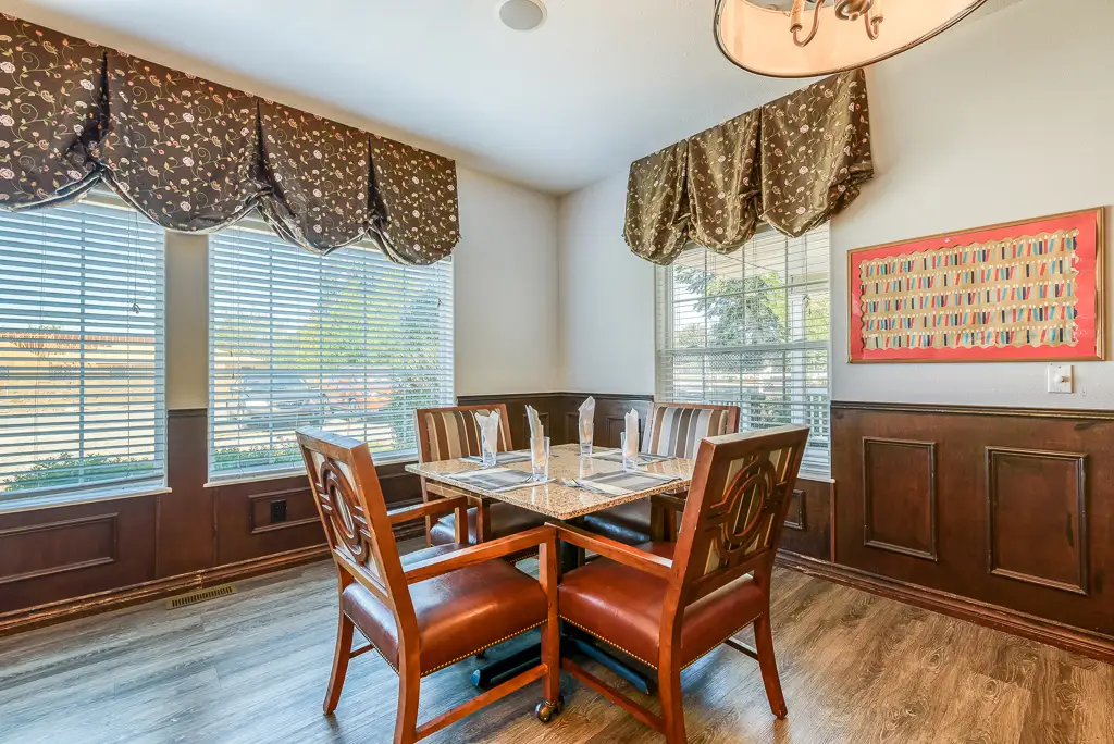 Chef putting the finishing touches on a delicious-looking plate of food