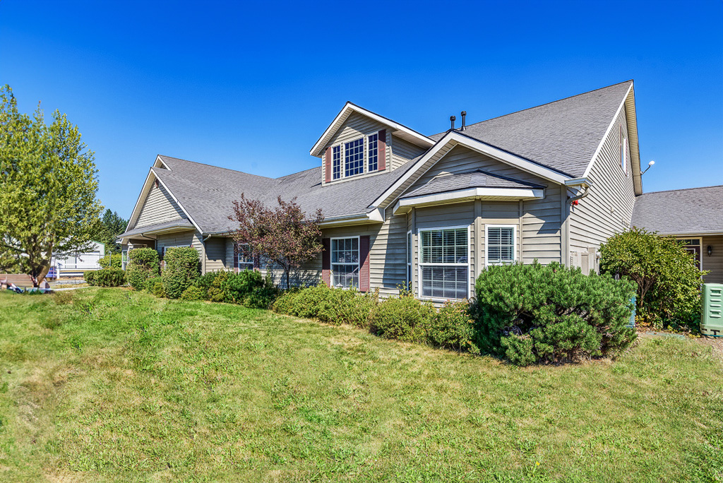 exterior view of community with green front lawn